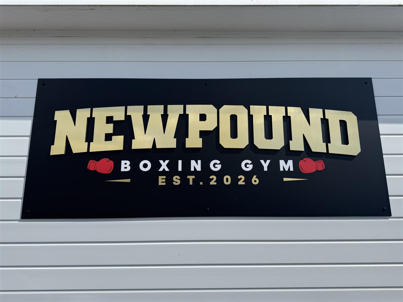 Newpound Boxing Gym sign — established 2026